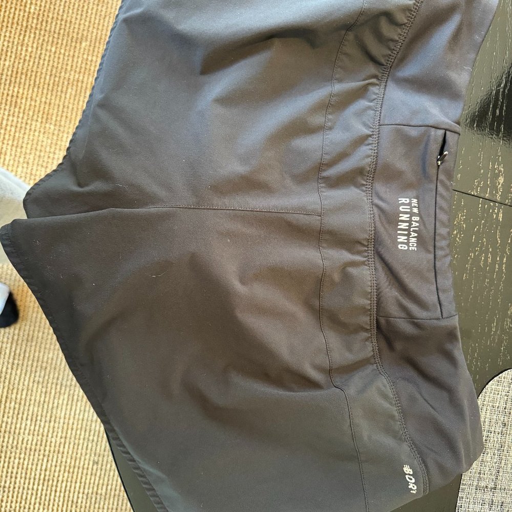 New Balance running short